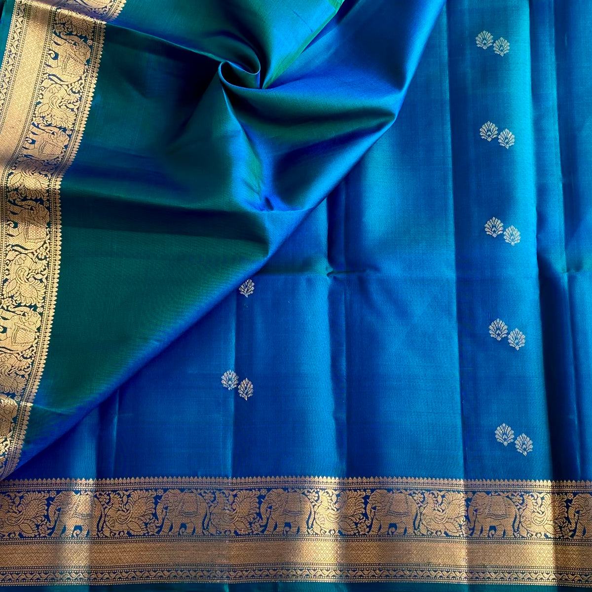 Peacock Blue Designer Pure Silk Saree With Twin Butta Antique Gold Zari