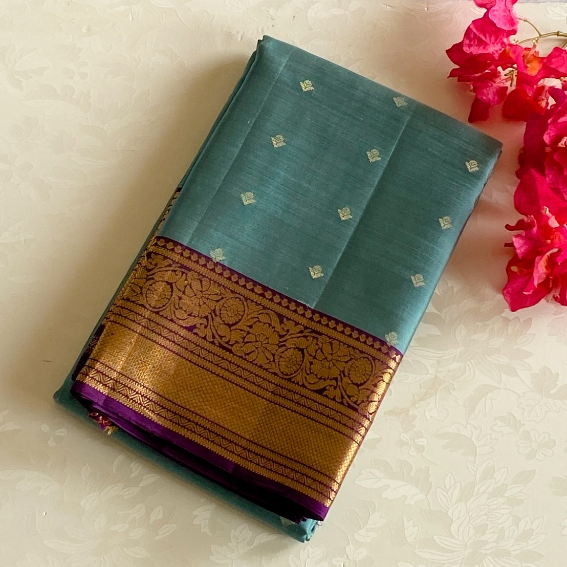 Teal Silk Saree with Plum Zari Border and Floral Pallu
