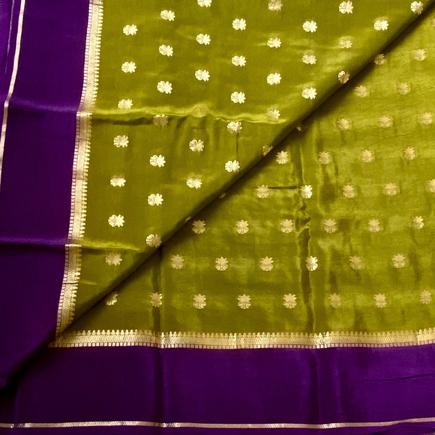 Olive Green soft crepe beauty with Deep Purple Zari Pallu and Border