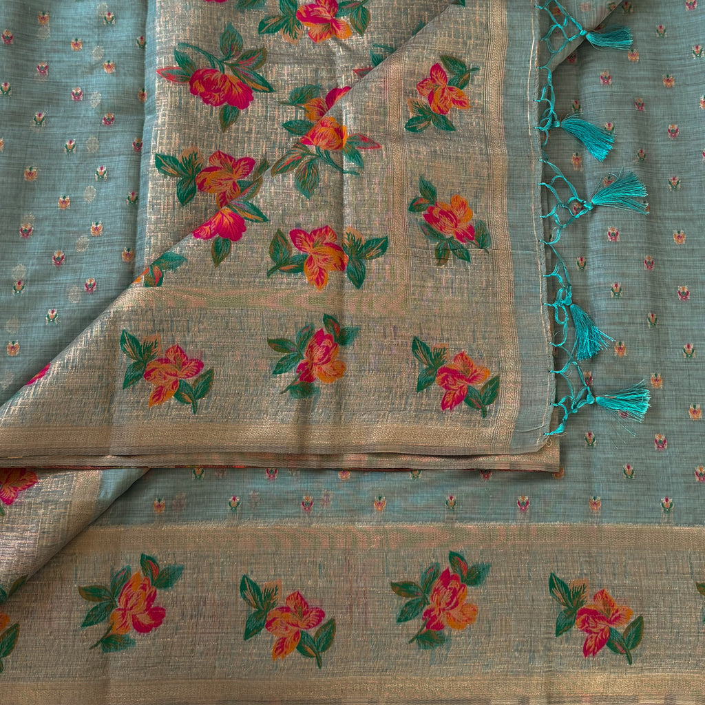 Festive Elegant Mint Green Floral Saree With Gold Zari Tassels