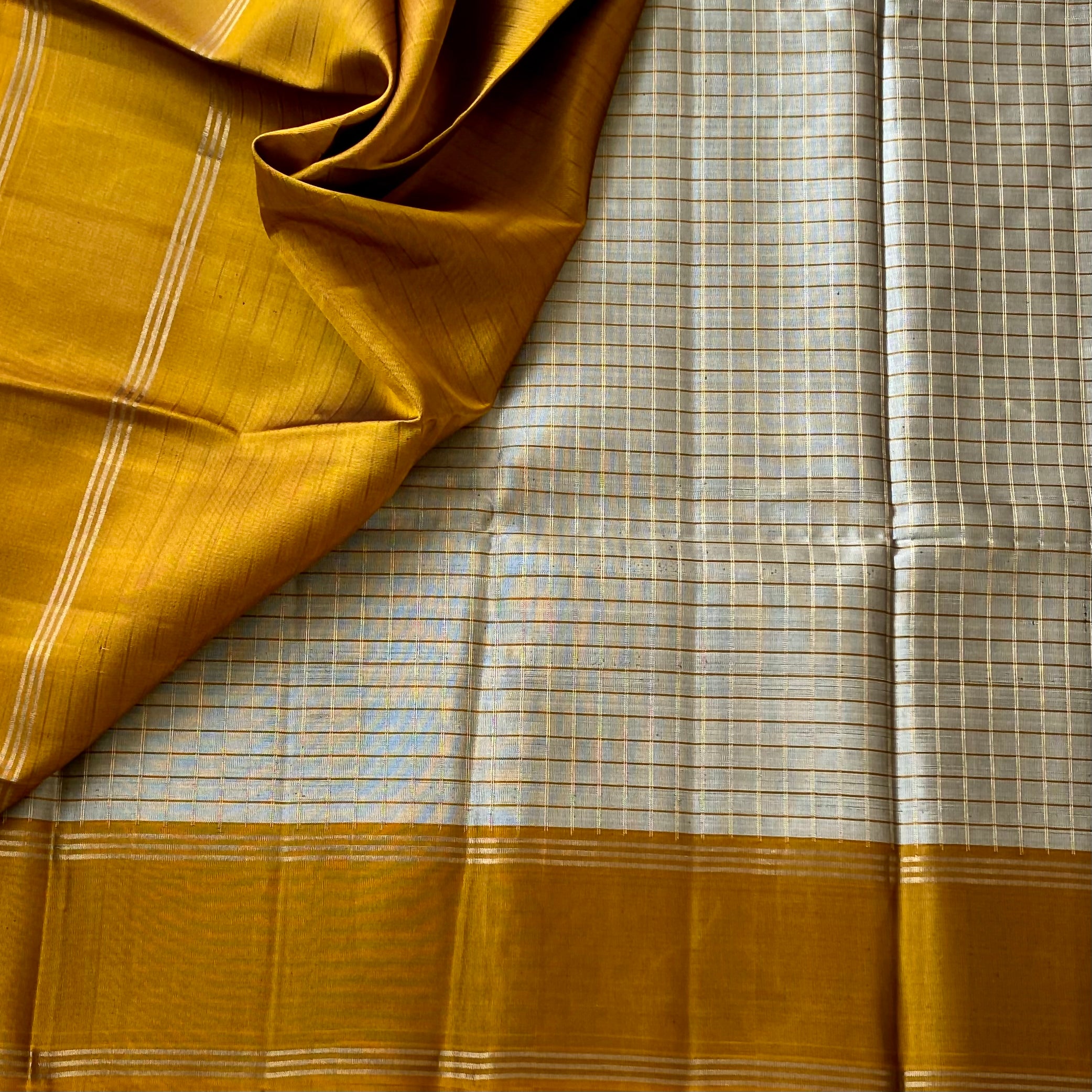 Metallic Amber Silk Saree Pale Silver Checked Pallu Gold Border
