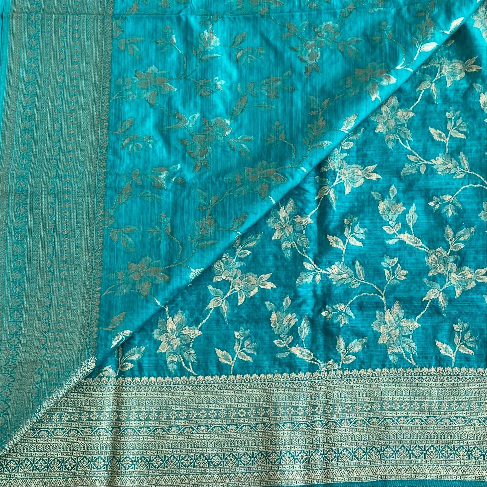 Azure Blue Soft Tussar Silk Saree With Gold Brocade Border