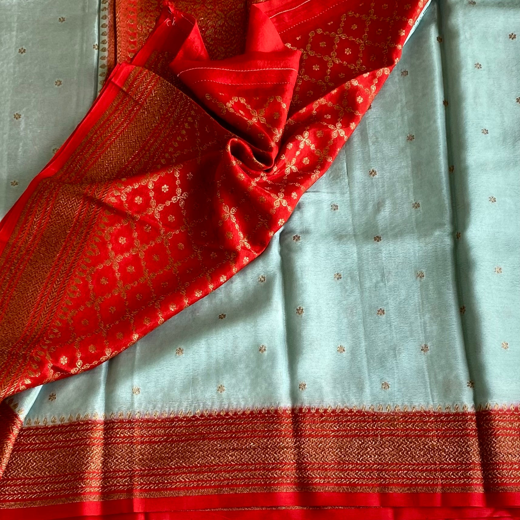 Powder Blue Banarasi Crepe Silk Saree With Scarlet Red Pallu
