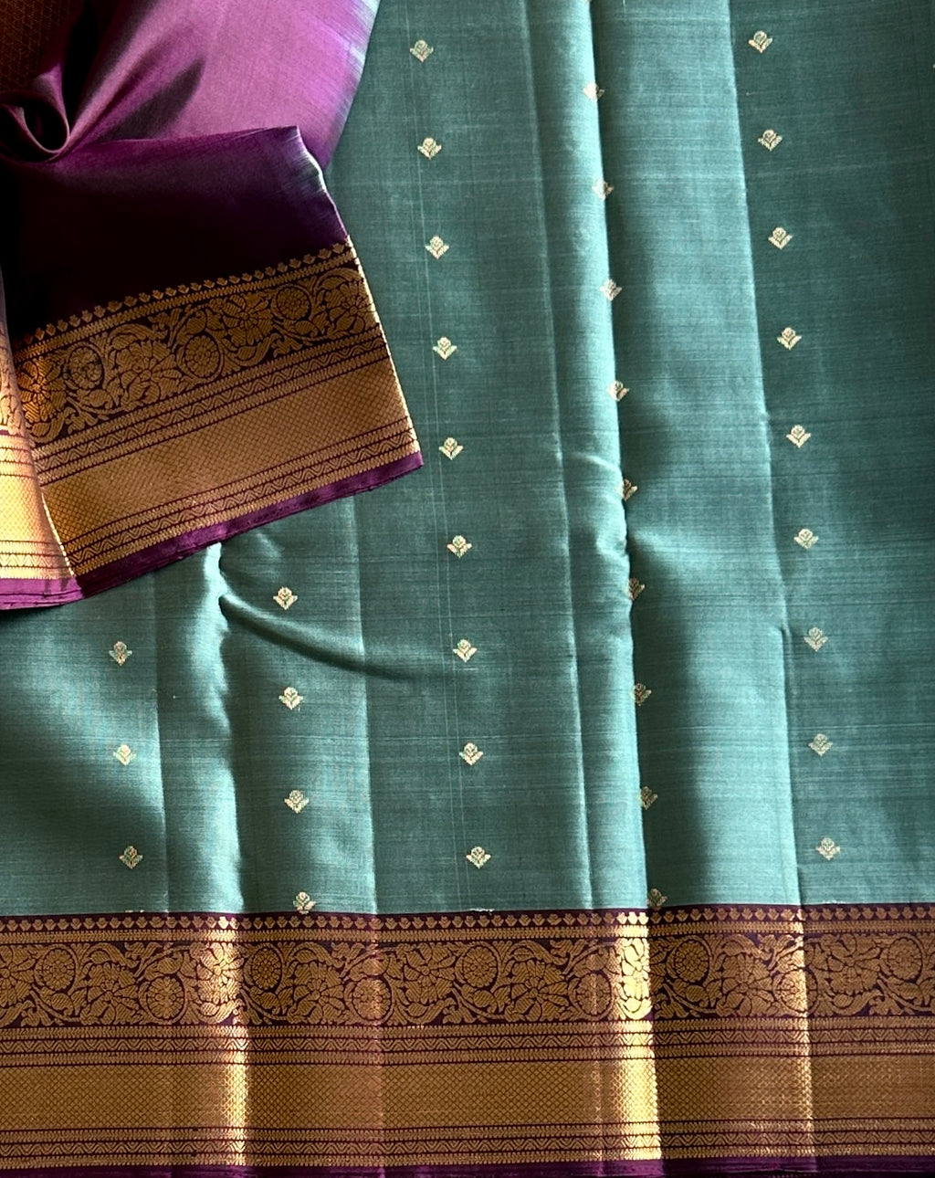 Teal Silk Saree with Plum Zari Border and Floral Pallu