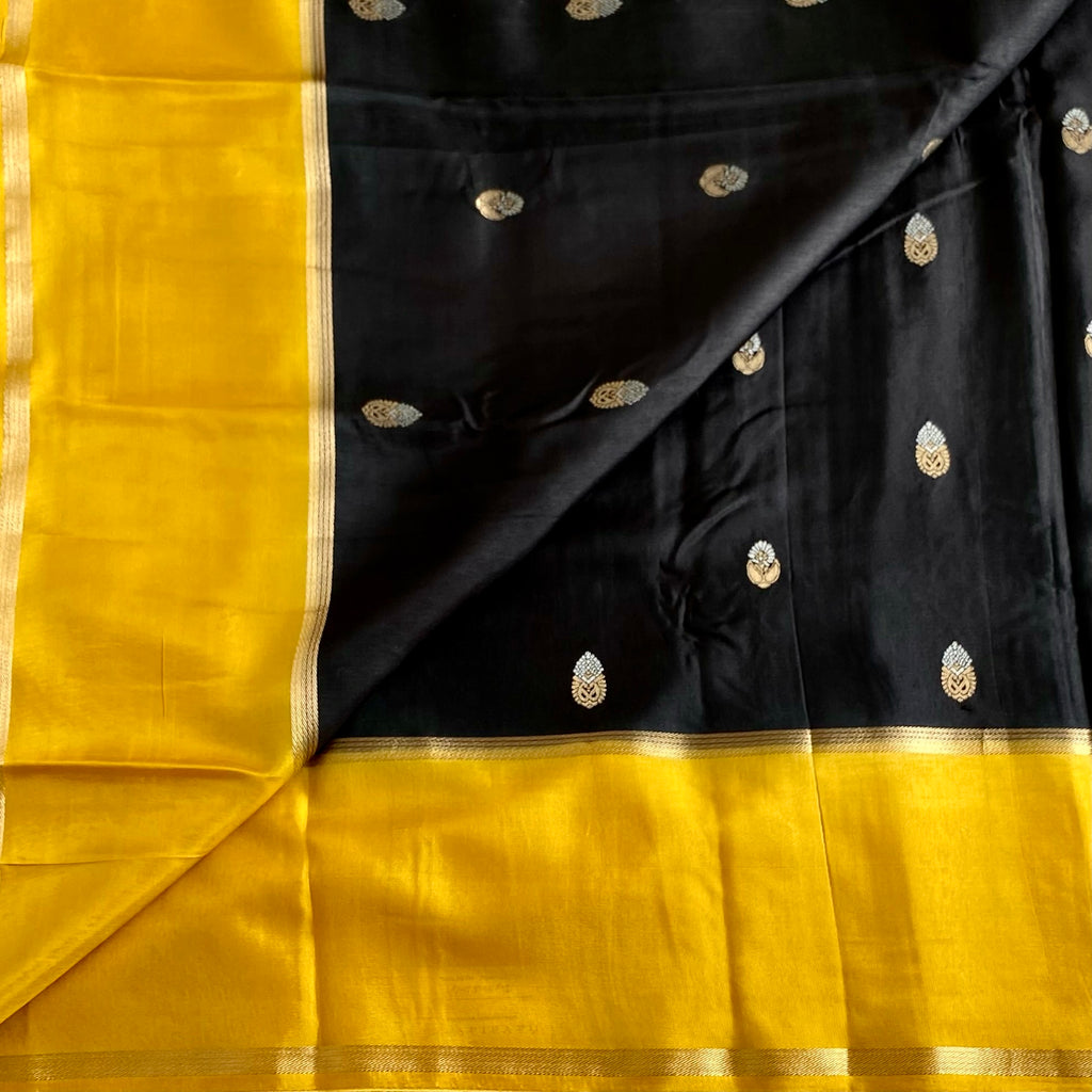 Exotic Black With Yellow Soft Tussar Silk With Antique Zari Buttas