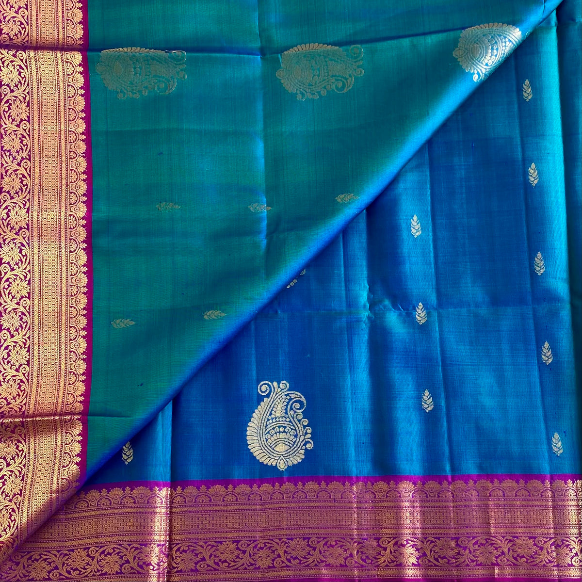 Teal Blue Designer Pure Silk Saree With Magenta Pallu And Paisley